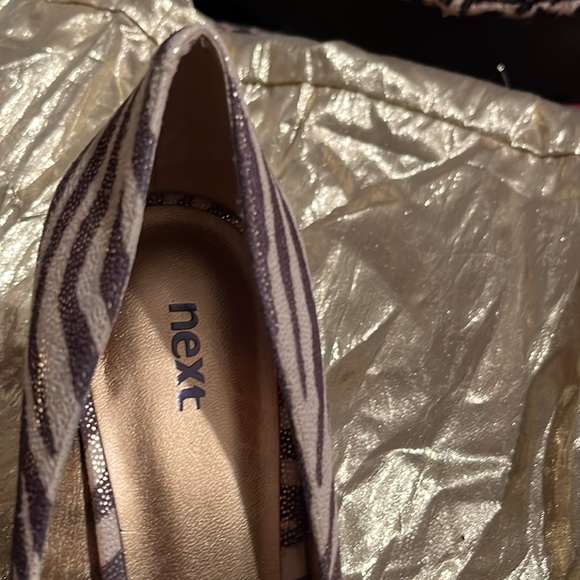 Animal print, brown, cream, gold fabric has a sueded finish - Picture 6 of 7